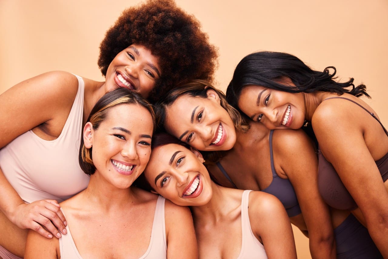 Group of five smiling women